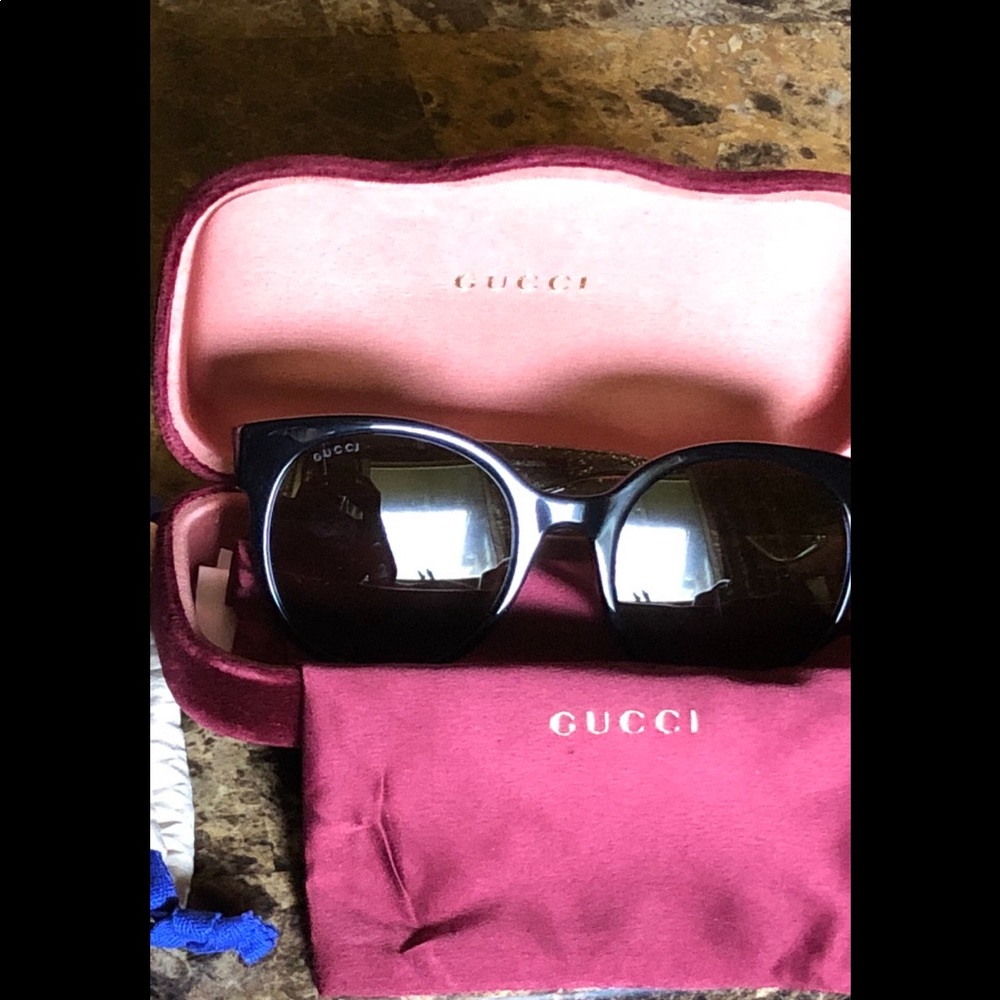 Women’s Gucci Sunglasses.